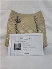 CHANEL BEIGE QUILTED PATENT LEATHER IN THE BUSINESS NORTH/SOUTH BAG (ule)